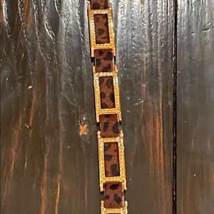 Tortoise design gold frame belt 40” long other side black leather